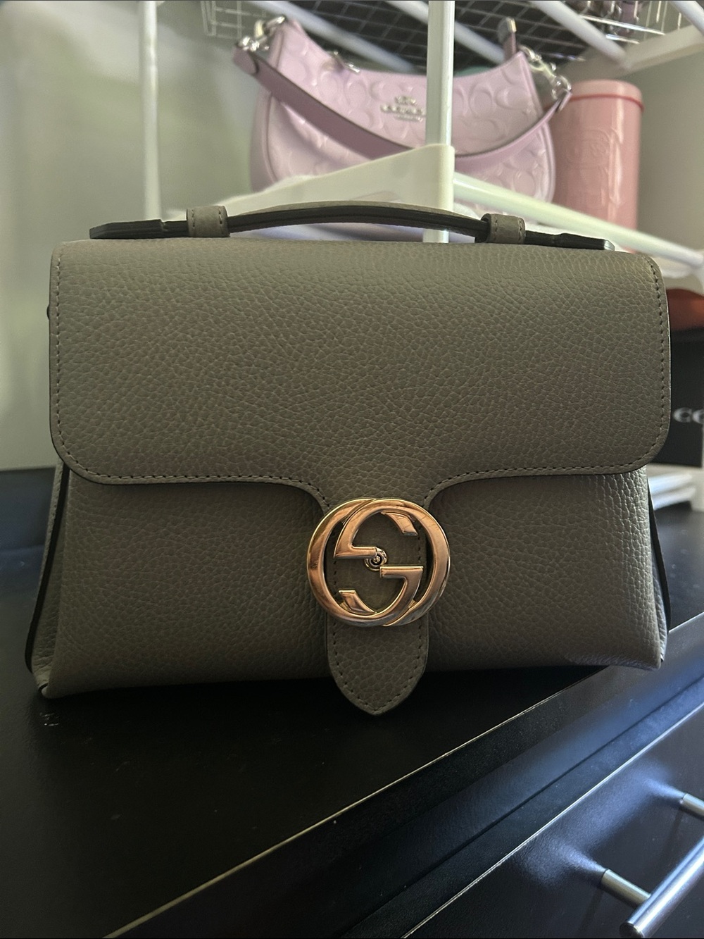 Gucci Interlocking handbag in calfskin leather with gold hardware